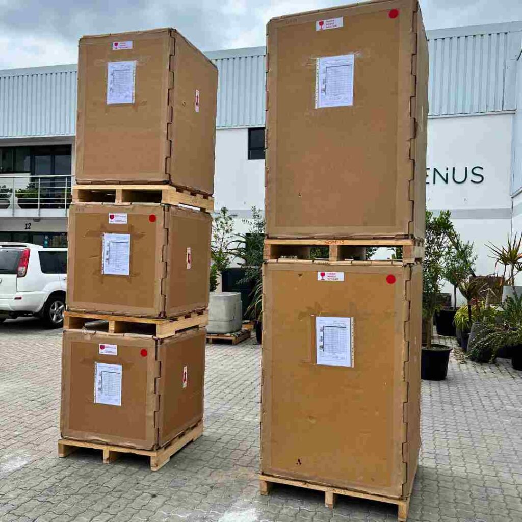 Freight crates with timber pallet base stacked for transport