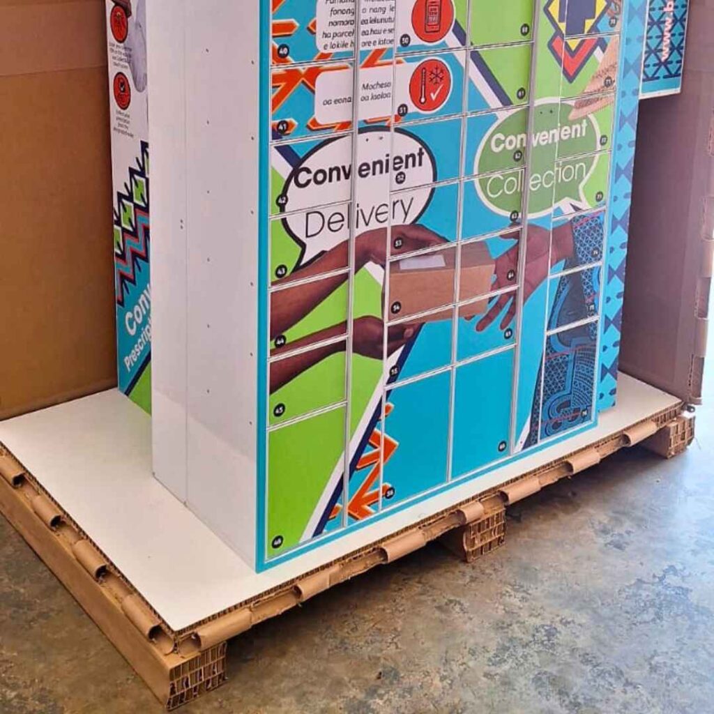 Custom electronics packaging using honeycomb board pallet base to protect electronic equipment during transport