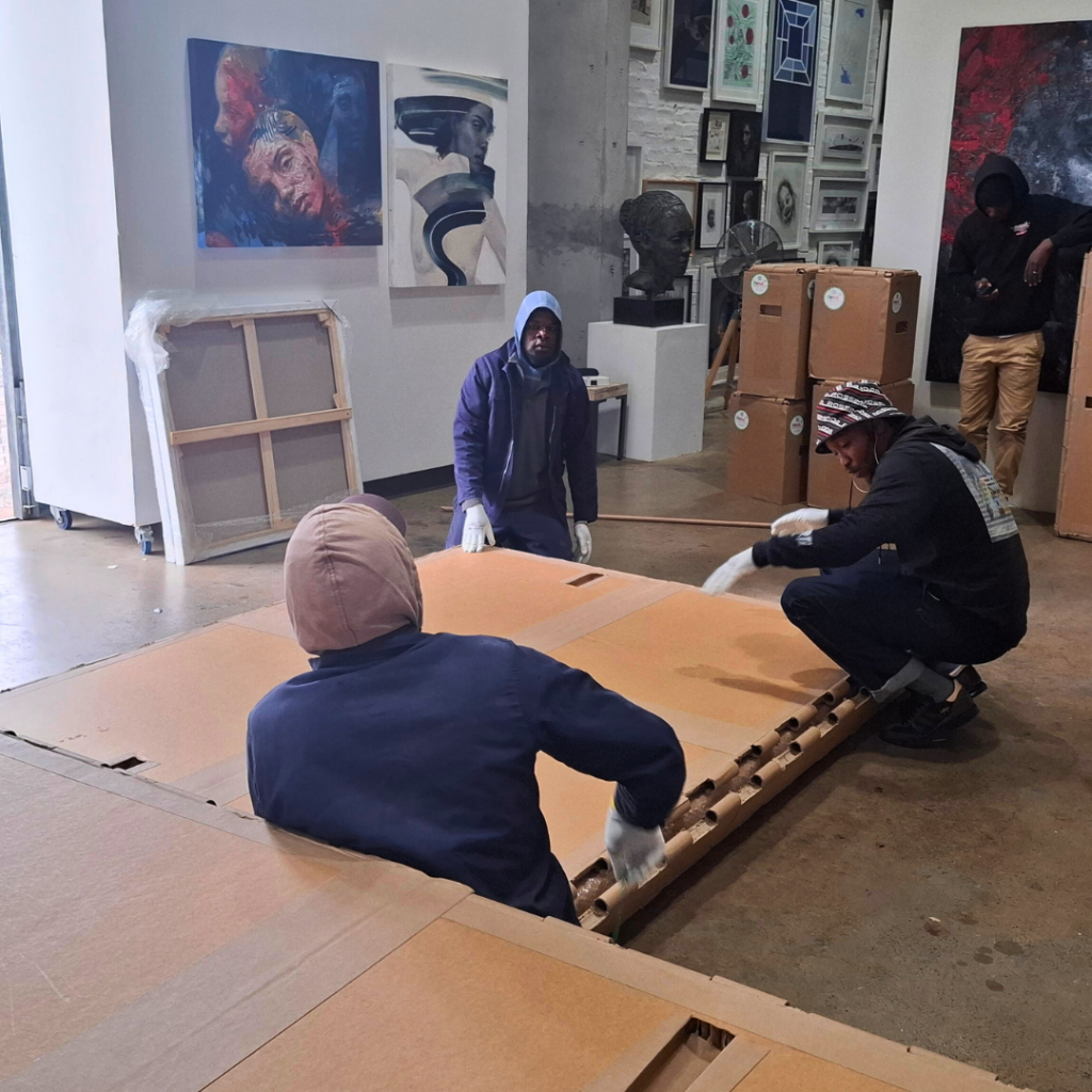 Rebul team preparing custom industrial packaging for manufactured products in South Africa