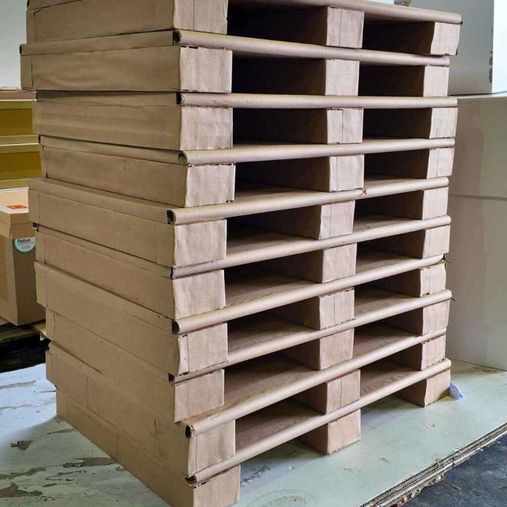 Honeycomb board pallets for lightweight load support