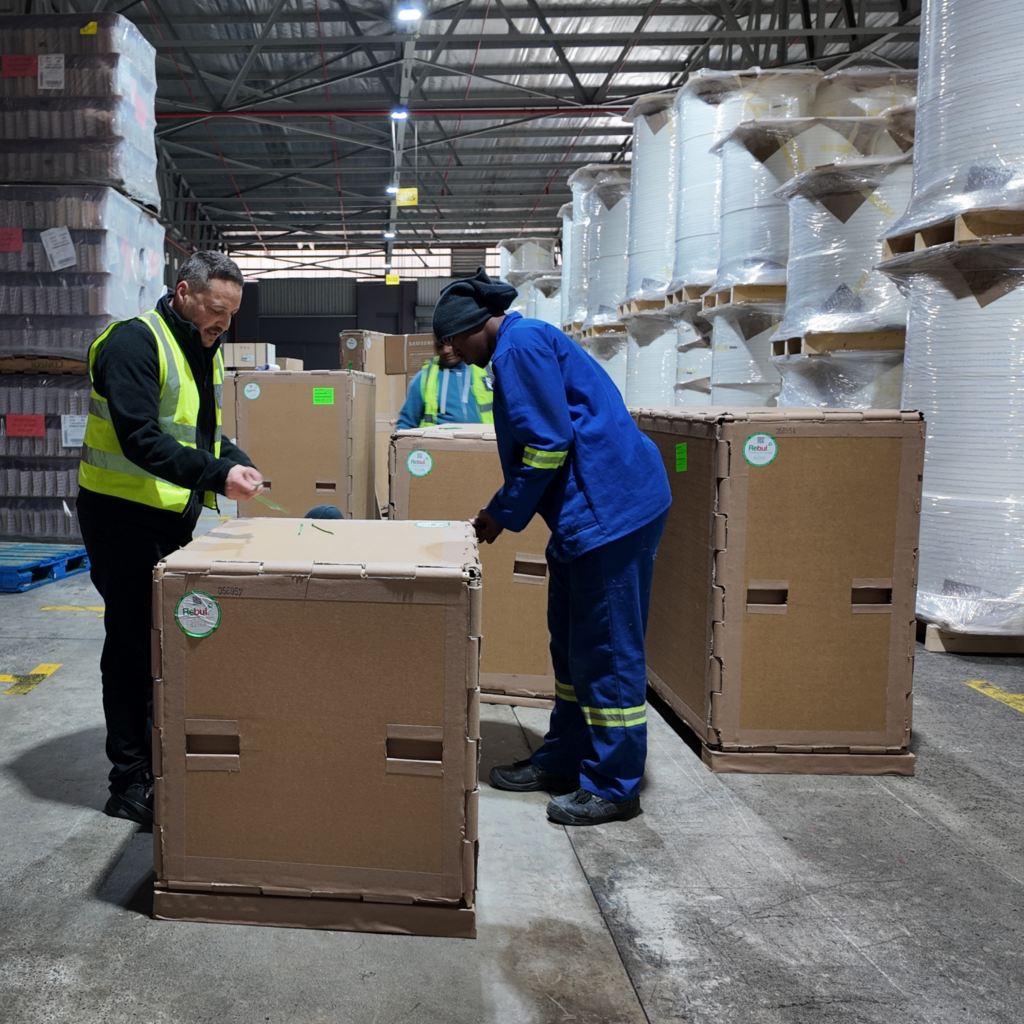 Rebul team preparing custom industrial packaging for manufactured products in South Africa